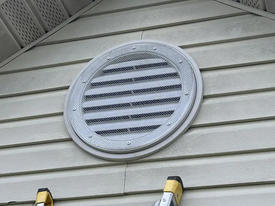 Gable vent sealed with heavy-gauge mesh screen after a bat exclusion